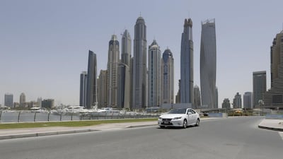 By UAE law, Uber is required to keep its rates at least 30 per cent above those of regular taxis. Jeffrey E Biteng / The National