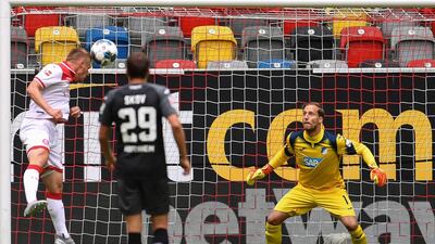 FORTUNA DUSSELDORF 2 HOFFENHEIM 2: Dusseldorf's Rouwen Hennings heads home the opening goal against Hoffenheim at the Dusseldorf Arena. AP