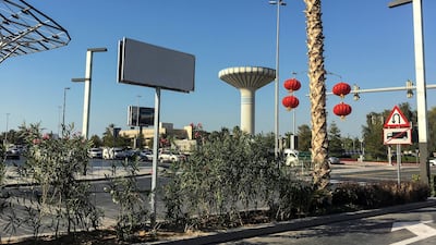 The authorities began covering up old Mustaqbal Street signs in City Walk - soon to be remaned Happiness Street. Antonie Robertson / The National