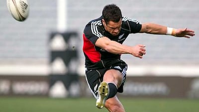 Dan Carter says the All Blacks will be in for a rough contest against the duo of Quade Cooper and Will Genia, and their Australian teammates.