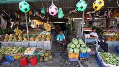 FUJAIRAH, UNITED ARAB EMIRATES - JUNE 2: Fruit vendors at their stalls in the small village of Sharm in Fujairah on June 2, 2010. (Randi Sokoloff / The National) For Business story by Armina/Rebecca and/or stock