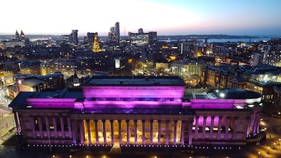 St George's Hall is illuminated in purple to commemorate International Holocaust Remembrance Day, in Liverpool, Britain. EPA