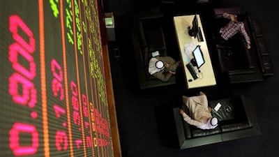 Equity markets in the UAE fell yesterday as investors cut their exposure to risk in Egypt amid growing political tension across the north African country. AFP PHOTO/KARIM SAHIB