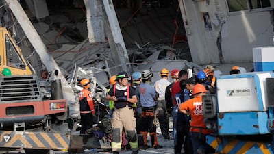 epa07522097 Search operations continue at a collapsed commercial building in Porac town, Pampanga Province, north of Manila, Philippines, 23 April 2019. A 6.1-magnitude earthquake occurred on 22 April in the Philippine region of Luzon with an epicenter located northeast of Zambales province, according to data from the Philippine Institute of Volcanology and Seismology (Phivolcs). According to latest data from the National Disaster Risk Reduction and Management Council (NDRRMC), at least seven people were killed, 81 were hurt and 24 are still missing. EPA/FRANCIS R. MALASIG