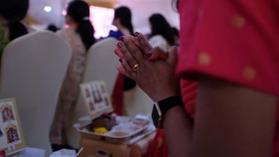 A Hindu prays at the foundation stone laying ceremony.