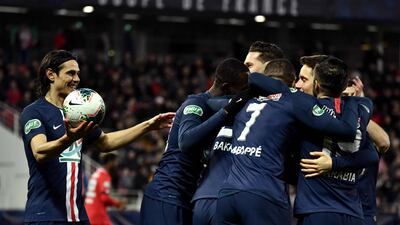 Paris players celebrate after a Dijon own-goal. AFP
