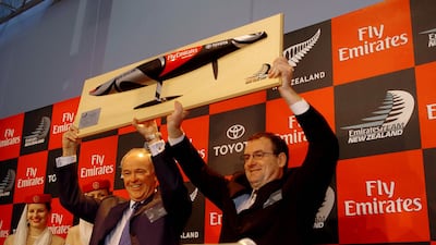 Emirates president Tim Clark receives a scale model of an Emirates Team New Zealand yacht from the nation's America's Cup Minister Trevor Mallard in Auckland, in 2004. Getty Images