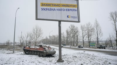 Destroyed military vehicles on the roadside in Kharkiv, north-east Ukraine. Reuters