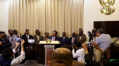 Sudan's new Prime Minister Abdalla Hamdok addresses the media following his swearing in at the presidential palace in Khartoum, Sudan. EPA
