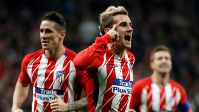 Atletico Madrid's Antoine Griezmann, centre, returned to goalscoring form on Wednesday night. Juanjo Martin / EPA