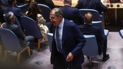 Mr Lavrov leaving the chamber. Reuters