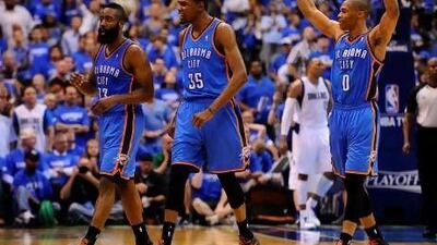 James Harden, left, Kevin Durant and Russell Westbrook, right, are ready to take a break after sweeping out the Dallas Mavericks in the first round of the NBA play-offs.