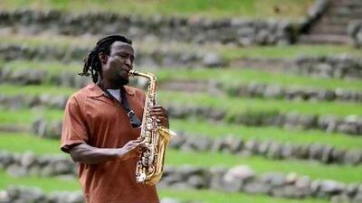 Kofi Karikari, a professional jazz sax player from Syracuse. AP Photo / The Post-Standard, Peter Chen