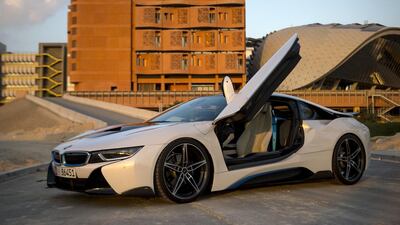 The BMW i8 in Abu Dhabi. The plug-in hybrid combines a 131hp electric motor at the front with a six-speed-automatic, petrol unit at the rear that generates 231hp from a 1.5L engine. Christopher Pike / The National