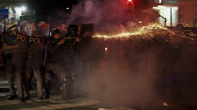 Riot police clash with supporters of Dilma Rousseff as they protest against new Brazilian President Michel Temer at the Paulista Avenue, in Sao Paulo, Brazil. Brazil’s Dilma Rousseff was stripped of the country’s presidency in an emotional impeachment vote Wednesday and replaced by conservative rival Michel Temer, who promised to heal Latin America’s biggest economy. Miguel Schincariol / AFP