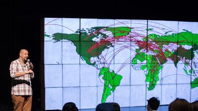 Christopher Myers and the completed map Nikith Nath / NYUAD