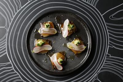 Open ravioli of king scallop. Courtesy All'Onda Dubai