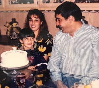 A young Sam Asghari with his parents. Instagram / Sam Asghari