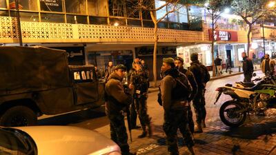 Lebanese security forces secure the street near the cafe in Hamra street in Beirut where a suicide bomber was arrested. Anwar Amro / AFP