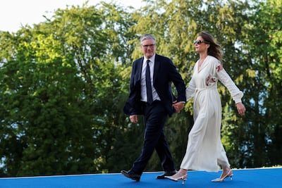 Britain's Prime Minister Keir Starmer and his wife Victoria attend the G7 summit. AFP