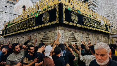 Shiite worshippers gather at the golden-domed shrine of Imam Moussa Al Kadhim, who died at the end of the eighth century, in Iraqi capital Baghdad. AP