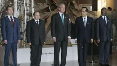 G8 and African leaders pose for a group photo. From left: the Russian president Dmitry Medvedev, the Algerian president Abdelaziz Bouteflika, the US president George Bush, the Japanese prime minister Yasuo Fukuda and the South African president Thabo Mbeki.