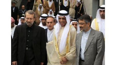 Sheikh Saud al Qassimi, the Ruler of Ras al Khaimah with Ali Larijani, left, the speaker of the Iranian parliament, and Mohammed Reza Fayyaz, right, the Iranian ambassador to the UAE, in Abu Dhabi.