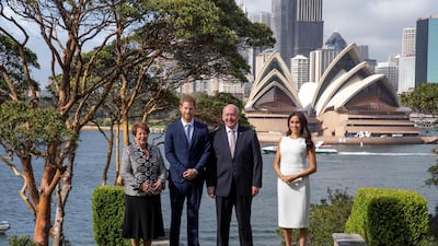With the Sydney Opera House in the background, Prince Harry and his wife Meghan meet Australian Governor-General Peter Cosgrove. AFP