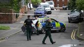 Police at the scene of a stabbing attack in North Belfast, Northern Ireland. Getty Images