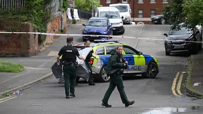 Police at the scene of a stabbing attack in North Belfast, Northern Ireland. Getty Images