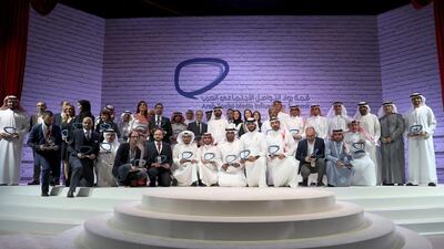 Sheikh Mohammed bin Rashid stands for a photo with the winners of the Arab Social Media Influencers Awards. Wam