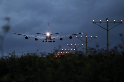 An Airbus A380 aircraft operated by Qantas Airways approaches to land at Sydney Airport in Sydney, Australia, on Thursday, February 21, 2019. Brendon Thorne/Bloomberg