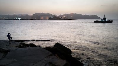 Ships at anchor around Qaboos Port in Muscat, Oman. More ships are now able to transit the Strait of Hormuz, easing crude supply worries. Getty Images