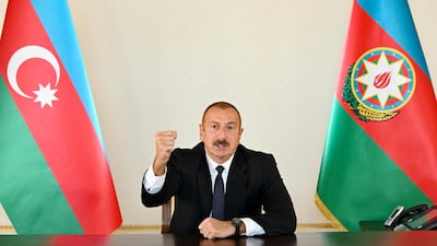 Azerbaijani President Ilham Aliyev gestures as he addresses the nation in Baku, Azerbaijan. AP