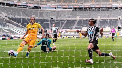 Harry Kane scores Tottenham's first goal against Newcastle. EPA