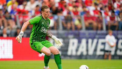 Everton goalkeeper Jordan Pickford controls the ball against Arsenal on Saturday. AP