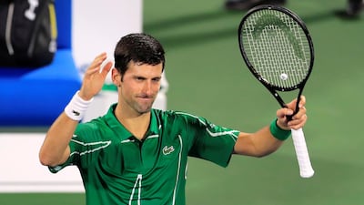 Novak Djokovic celebrates after beating Malek Jaziri in the Dubai Duty Free Tennis Championships first round on Monday. Reuters