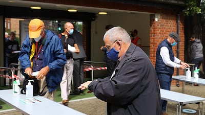 Spectators use disinfectant on arrival at The Oval. Getty