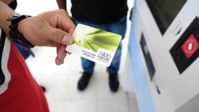 The new Abu Dhabi bus system’s smart card, Hafilat, rolled out on May 15, 2015, with bus riders now able to purchase the smart card for monthly use or a reloadable card with various amounts. Delores Johnson / The National