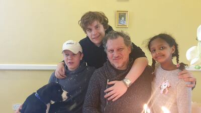 Australian Robert Pether pictured with his three children before his detention. Courtesy: Desree Pether