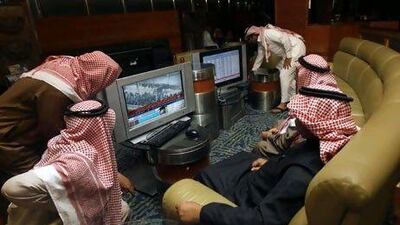 Audience figures for news channels in Saudi Arabia have doubled since protests began in some parts of the Mena the region. Above, traders in Riyadh watch a report on Egypt. Fahad Shadeed / Reuters