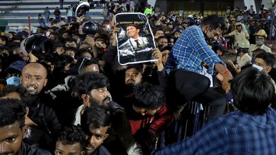 Fans arrive to pay their respects to the late actor Puneeth Rajkumar, who died aged 46, at the Sree Kanteerava Stadium in Bengaluru, India. Reuters