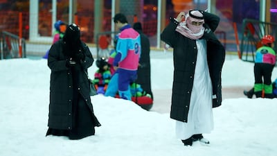 Growth in Saudi's non-oil private sector continues to grow. Pictured, a Saudi couple walk in the new Snow City at Al Othaim Mall in Riyadh. Faisal Al Nasser / Reuters