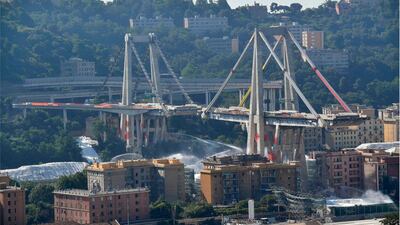 The Morandi bridge moments before a planned expolosion, in Genoa, Italy. AP