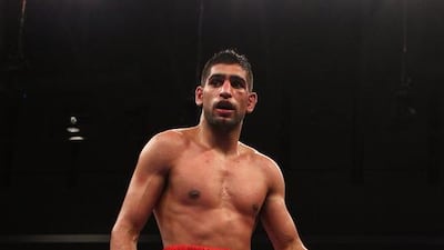 Amir Khan unleashed a flurry of verbal jabs Tuesday at Floyd Mayweather after the unbeaten American passed him over for a lucrative May 3 bout and chose Argentina’s Marcos Maidana. Al Bello/Getty Images