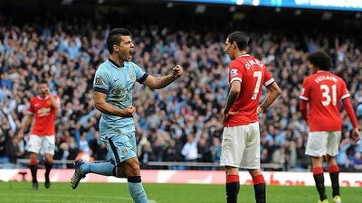 Manchester City's Sergio Aguero celebrates after scoring the winner against Manchester United at the Etihad stadium in Manchester. Peter Powell / EPA