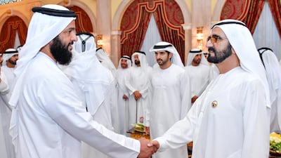 Sheikh Mohammed bin Rashid welcomes a guest at the function held at Za’abeel Palace.