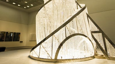 ‘Fountain of Light’ (2016) by Chinese artist Ai Weiwei shines in the last room of Louvre Abu Dhabi but the sculpture has an intriguing history dating back to 1919 Christopher Pike / The National