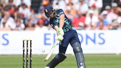 Jos Buttler of England hits the ball to the boundary. Getty Images