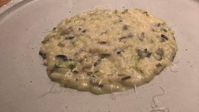 Braised lettuce risotto with wild rice and parmesan rinds at Lowe's Waste Not supper. Sophie Prideaux / The National